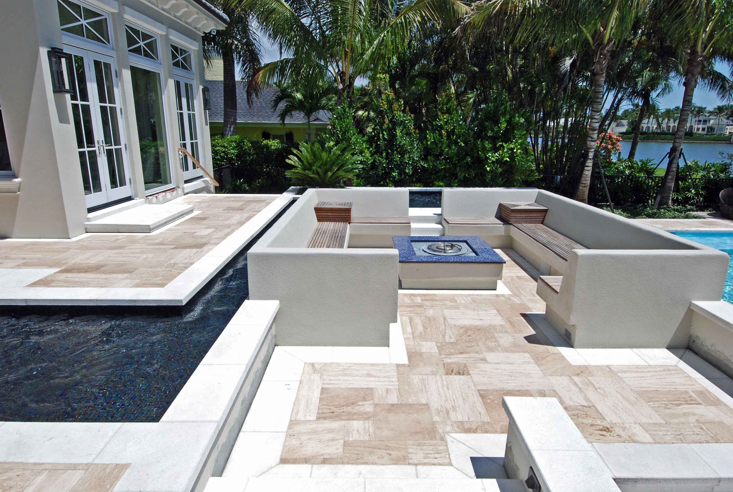 Fire Pit With Seating Surrounded By Pool Jackson Pools Inc Fire Pit With Seating Surrounded By Pool Jackson Pools Inc Serving Estero Naples Fort Myers Southwest Fl